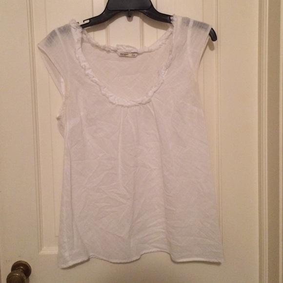 Sleeveless dress shirt.