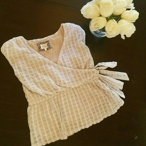 Anthropologie creme lined wrap style blouse