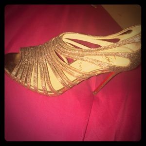 Christian Louboutin gold heels