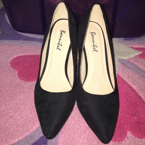 Black suede pumps