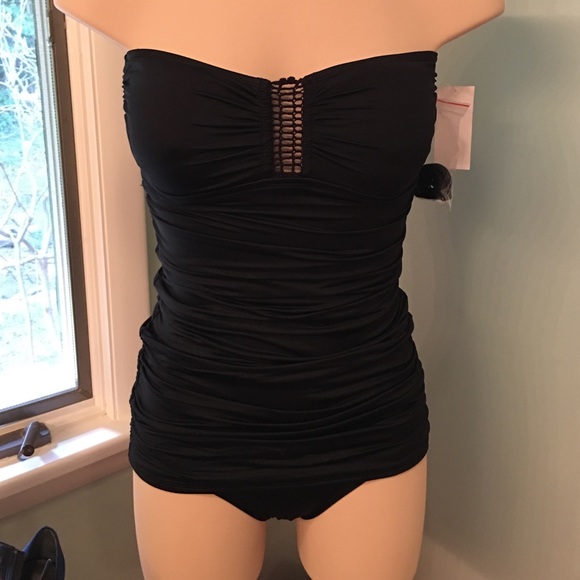 Black one piece suit with roushing