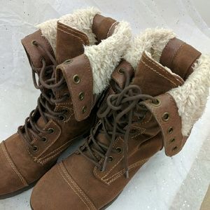 Transformable furry lace up shoe.