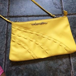 Cute yellow volcom stone clutch