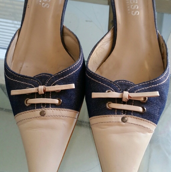 Leather front/navy blue jeans shoes.
