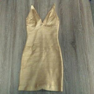 Gold bandage dress.