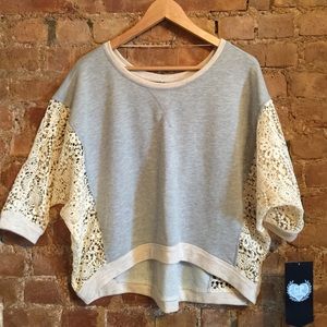 Beautiful crochet cut out sweatshirt