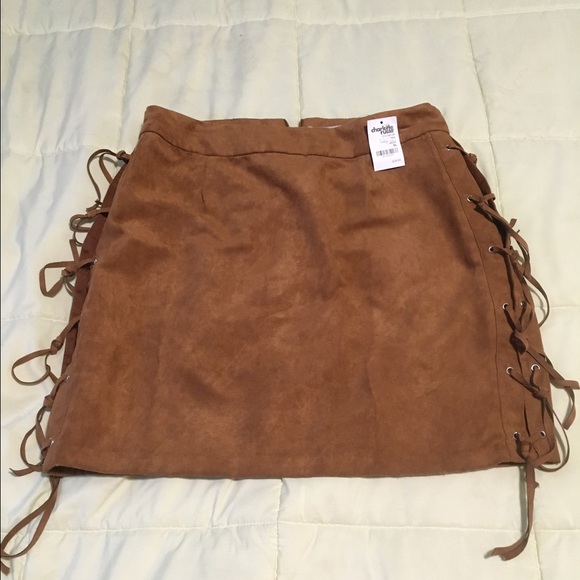 Charlotte Russe Dresses & Skirts - Suade mini skirt with ties at side. NEW