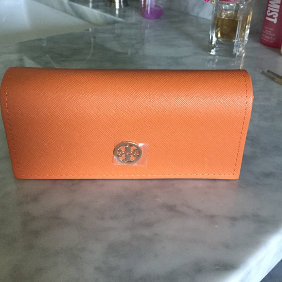 Tory Burch sun glasses case.