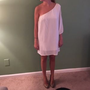 One shoulder white flowy dress