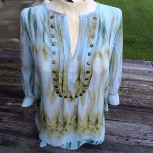 Tie died tunic with gold brads.