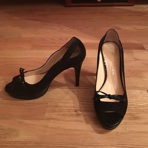Black peep toe pumps