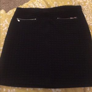 Black quilted mini skirt