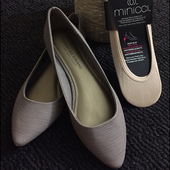 A pair of shoes with ultra low foot liner