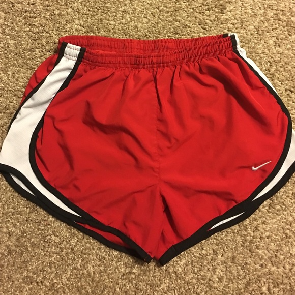 Red Nike shorts