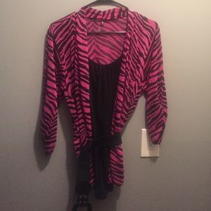 Pink and black zebra print shirt.