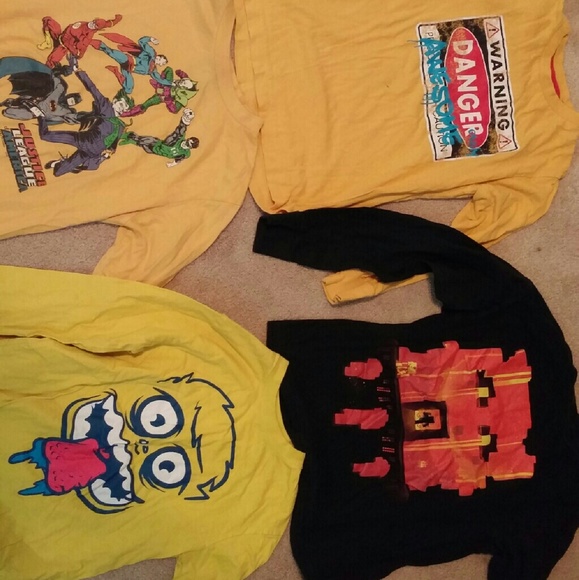 Four boys t shirts size 6/7 or small