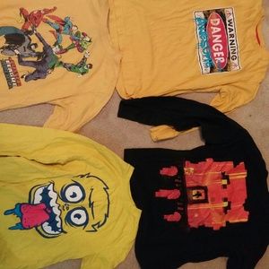 Four boys t shirts size 6/7 or small