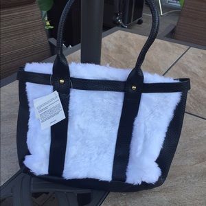 Black with white fur bag