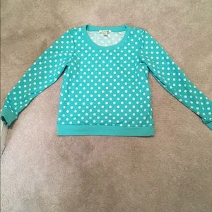 Long sleeve mint green top with white polka dots