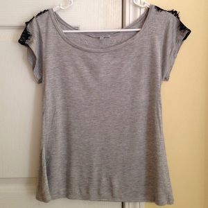 Gray short sleeved shirt with lace shoulders