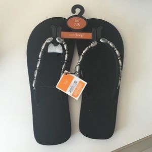 Black flip flops with gem straps