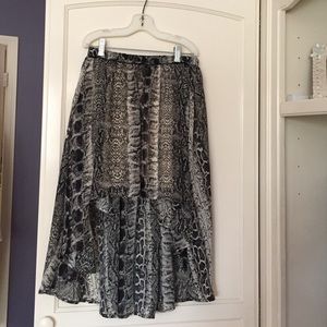 A low high skirt. Leopard print.