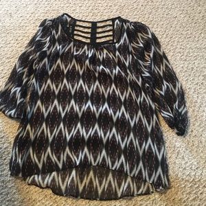 A. Byer black white and red blouse