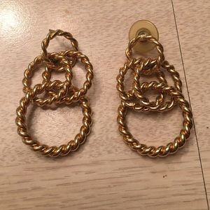Gold tone hoop earring