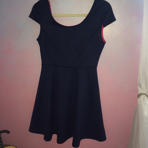 navy dress with pink bow on back