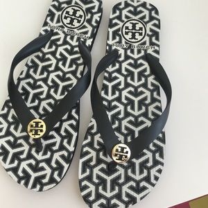 Tory Burch thin flip flops never worn!