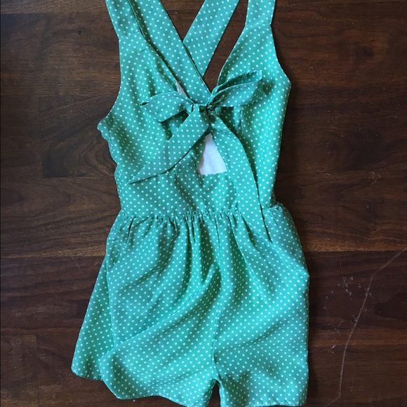 Mint green romper with white spots
