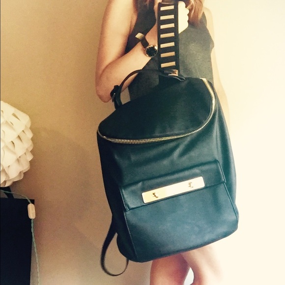 Black leather and gold backpack