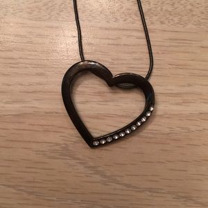 Black heart with stones