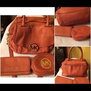 Orange Michael Kors purse wallet and makeup case