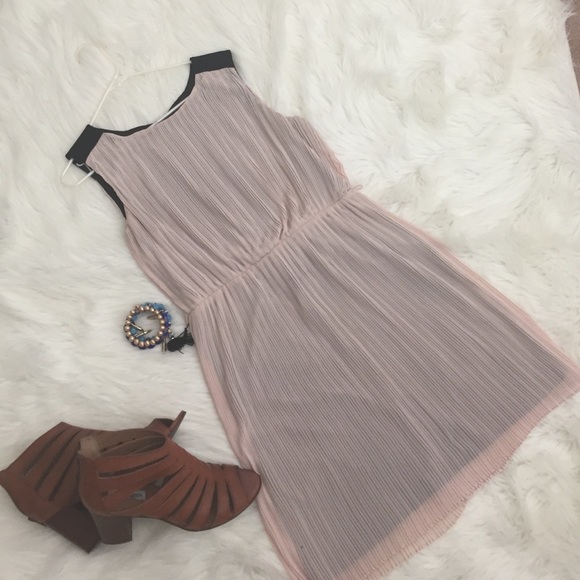 Beautiful pleated dress by Jennifer Lopez.