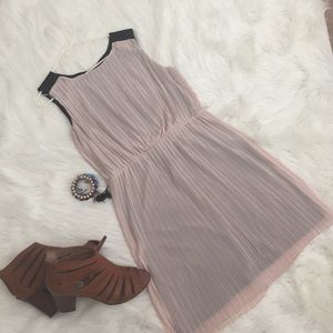 Beautiful pleated dress by Jennifer Lopez.