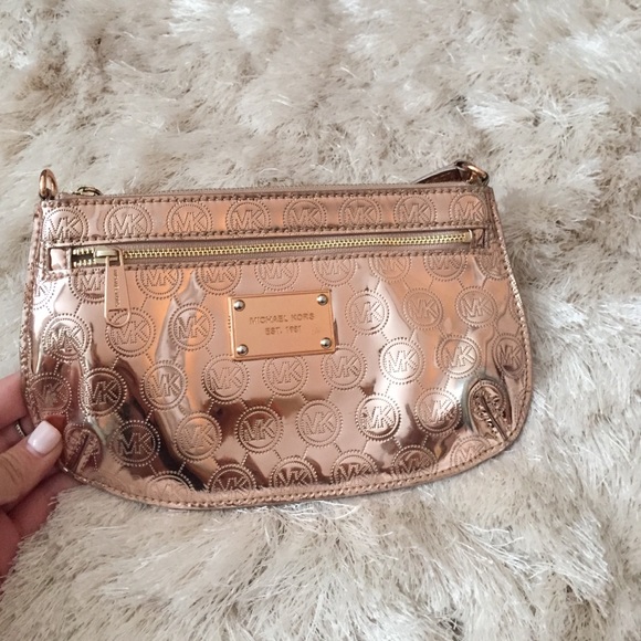 Michael Kors rose gold metallic clutch