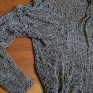 Knitted holy sweater