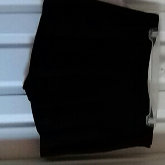 Mini black pleated shorts
