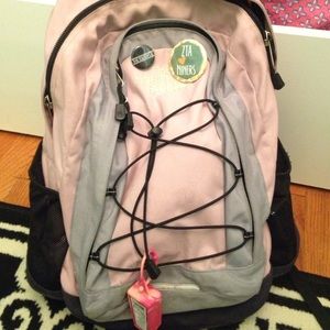 North face pink book bag