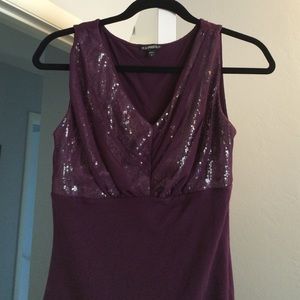 Express purple top. Sequines on top.
