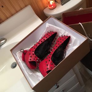Red Spiked Heels