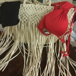 White beach bag which fringes