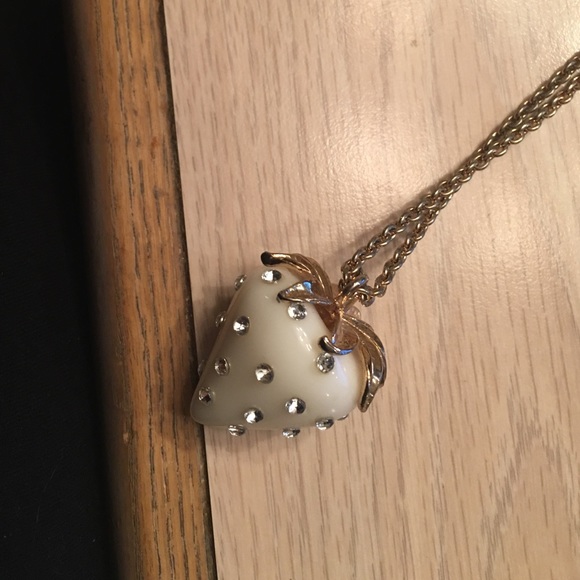 Long white strawberry  with stones