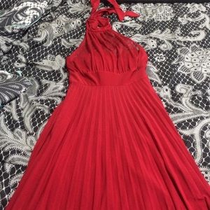 Red accordion pleat dress with sheer halter style