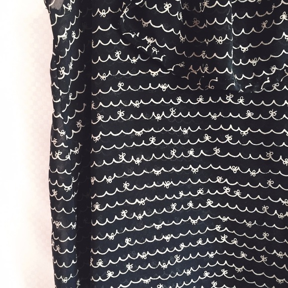 Ruffled Sleeveless Top - Picture 2 of 4