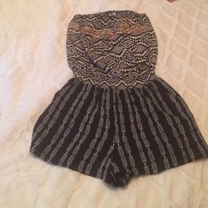 This is a small Romper in excellent condition.