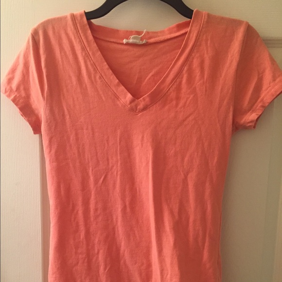 Salmon/orange colored v-neck