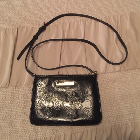Michael Kors patent leather cross body bag.
