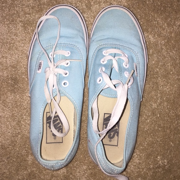 Light teal colored Van's.